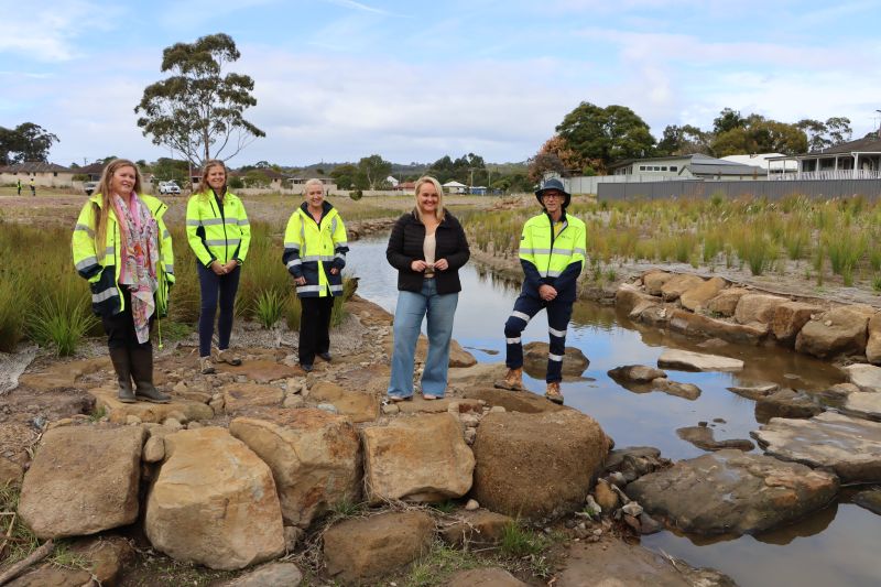 Newcastle Lord Mayor Nuatali Nelmes (centre) with City of Newcastle representatives (L-R) Karenne Jurd, Marnie Kikken, Michelle Bisson and Stephen Long celebrated World Environment Day with a visit to the latest section of Ironbark Creek to be rehabilitated under City of Newcastle's award-winning multi-stage program.
