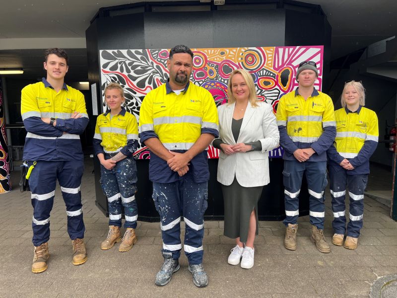 Painting and Decorating Tradesperson Garry Welsh and Lord Mayor Nuatali Nelmes (front) with apprentices (L-R) Nic Bourke, Kahli Mortimer, Conner West, and Jazmin Webber.
