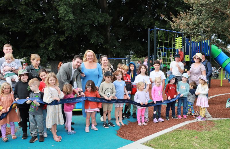 Councillor Katrina Wark, Deputy Lord Mayor Declan Clausen, Lord Mayor Nuatali Nelmes, Councillor Deahnna Richardson and Mayfield community members officially open the new playground at the Avon Street Reserve.