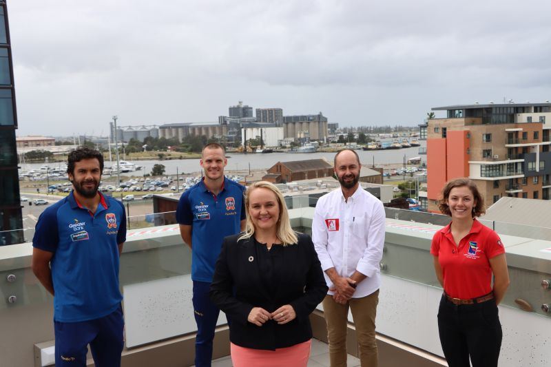 Newcastle Jets players Nikolai Topor-Stanley and Nigel Boogaard, Newcastle Lord Mayor Nuatali Nelmes, Sailing Championship League Asia Pacific event director Mark Turnbull and Newcastle sailor Courtney Smith.