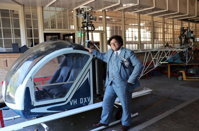 City of Newcastle Manager Collections and Community Partnerships David Hampton with the one-of-a-kind helicopter designed and built by Newcastle engineer Duan Phillips.