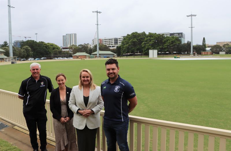 Newcastle District Cricket Association Competition Administrator John Bailey, Councillor Peta Winney-Baartz, Newcastle Lord Mayor Nuatali Nelmes and Newcastle City Australian Football Club Co-President Courtney Knight celebrate the reopening of No.1 Sportsground.