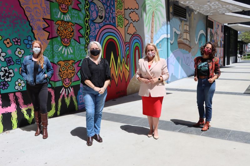 Little Festival organiser Jacinta Fintan, Cr Carol Duncan, Newcastle Lord Mayor Nuatali Nelmes and Big Picture Fest organiser Katerina Skoumbas in front of murals created by artists Sophia Flegg, Mitch Revs and Tom Henderson during last year's Big Picture Fest.