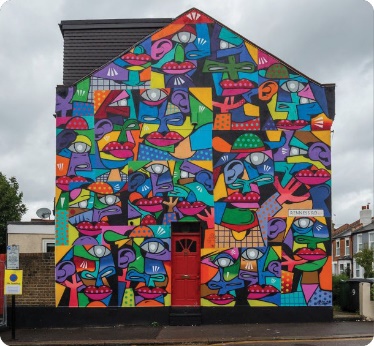 A building with a colourful painted wall.