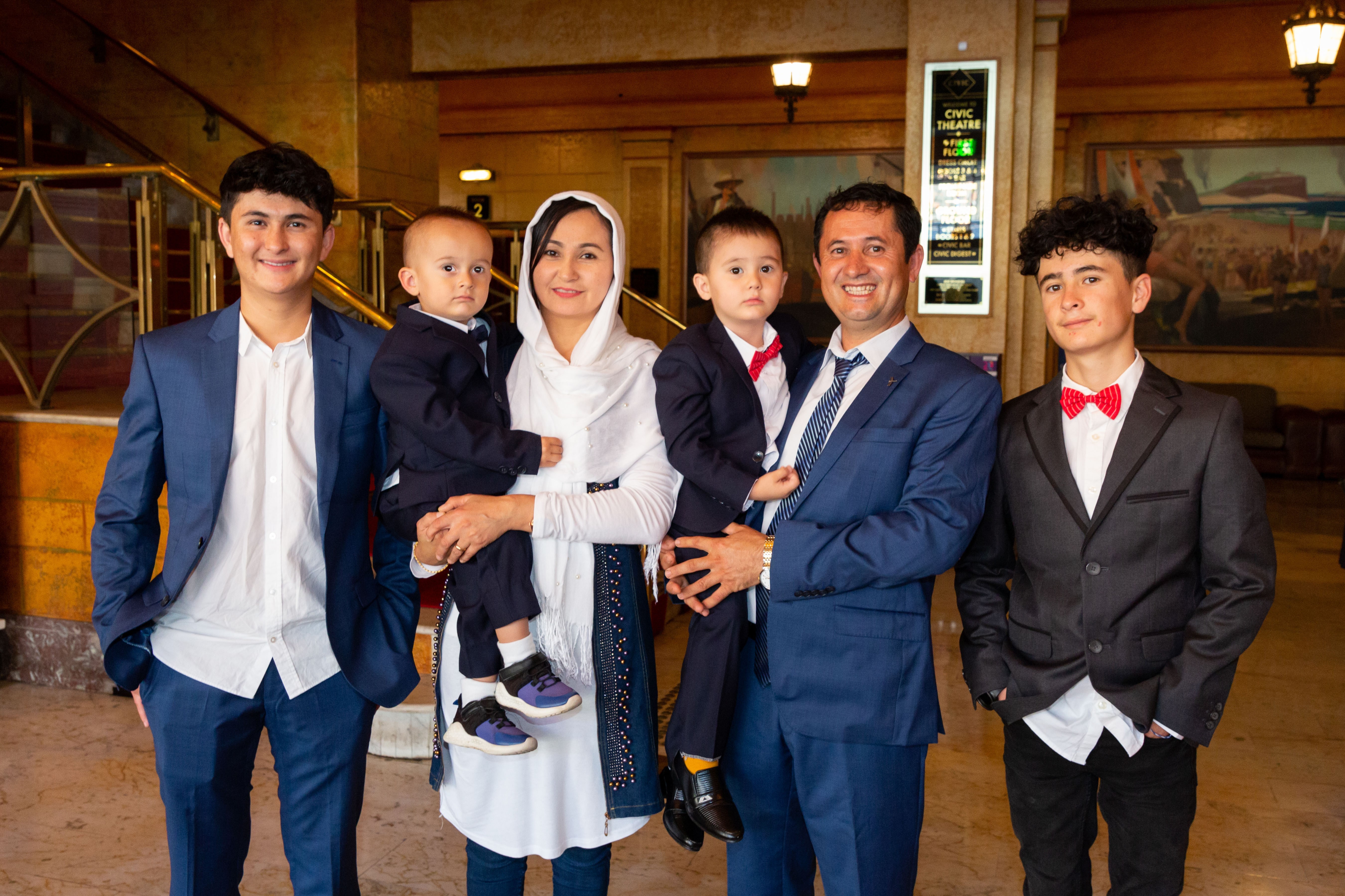 New-citizen-Mr-Khodadad-Karimi-with-his-wife-and-four-sons.jpg