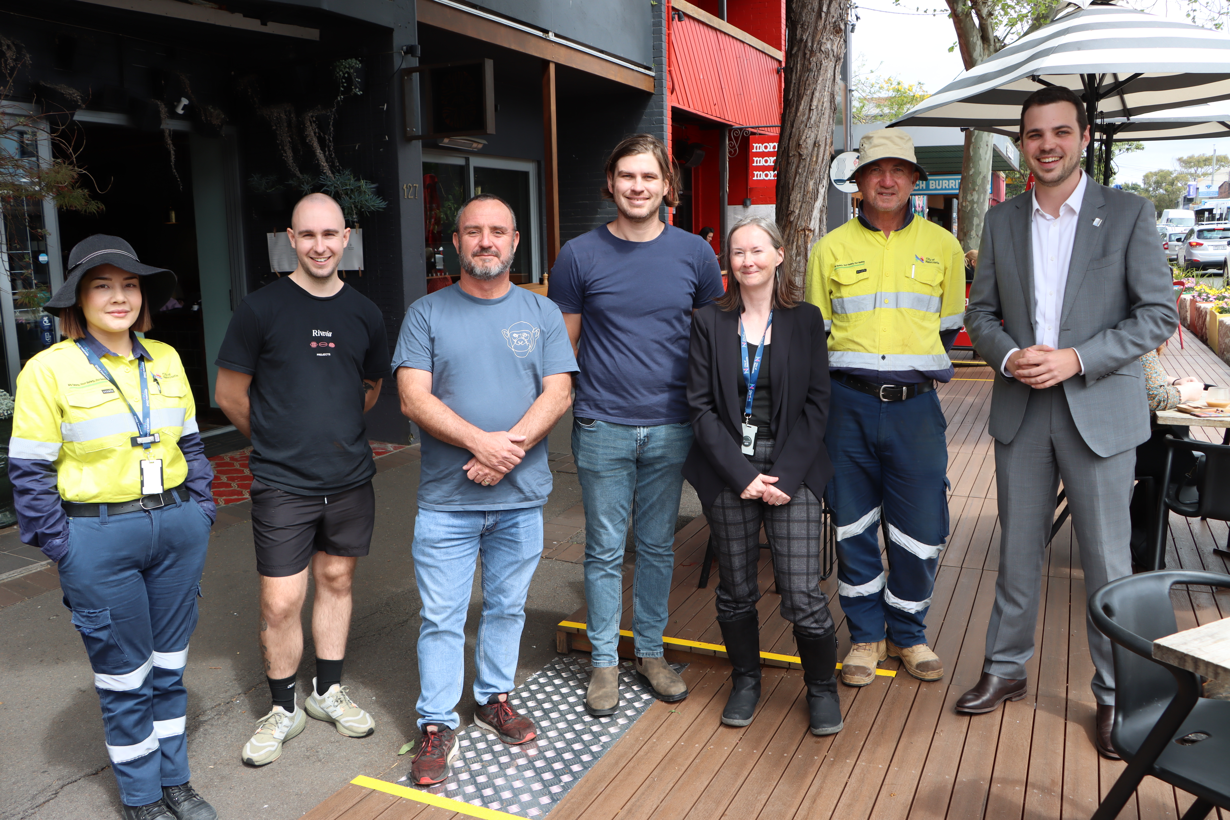 CN Project Manager Bianco Field-Vo, Autumn Rooms co-owner Taylor Schneider, Three Monkeys Café owner Anthony Strachan, CN Senior Civil Project Officer Clinton O'Meley, CN Senior Project Manager Sarah Horan, CN field worker Peter Moore, and Deputy Lord Mayor Declan Clausen