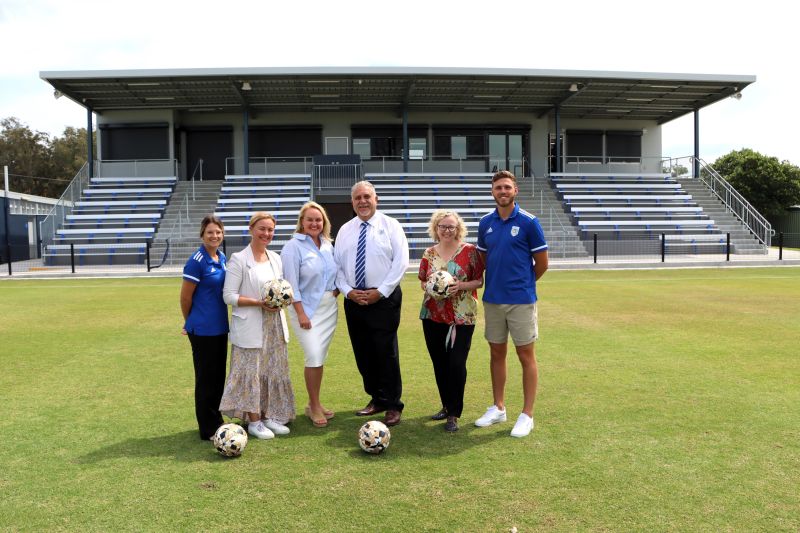 Newcastle Olympic Women's Captain Jemma House, Chair of City of Newcastle's Sports Infrastructure Working Party Councillor Peta Winney-Baartz, Newcastle Lord Mayor Nuatali Nelmes, Newcastle Olympic Football Club President George Sofianos, Federal Member for Newcastle Sharon Claydon and Newcastle Olympic Men's Captain Marcus Duncan at the official opening of the new grandstand at Darling Street Oval.