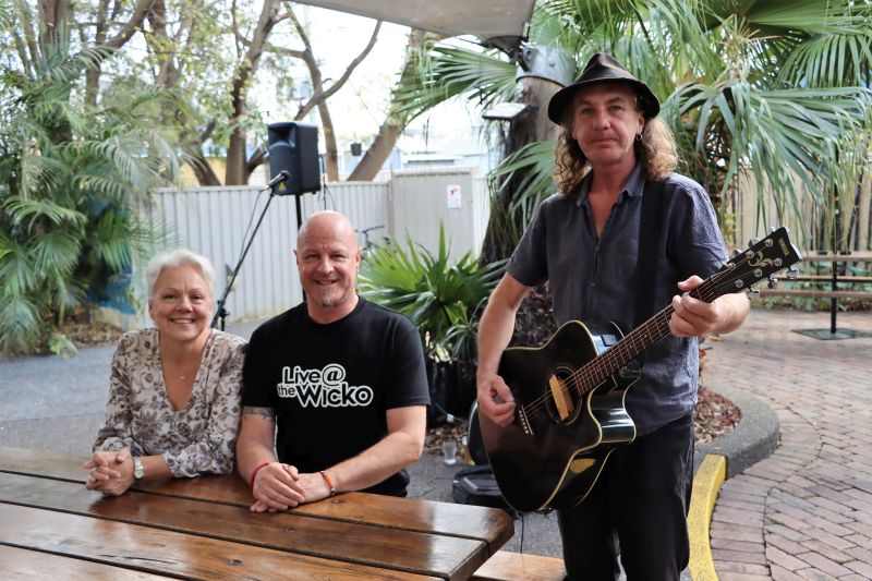 Councillor Carol Duncan, Wickham Park Hotel owner Marcus Wright and musician One Man Dan announce the new round of Locally Made and Played funding from City of Newcastle.