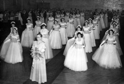 Women in gowns posing in unison at Debutante Ball Newcastle